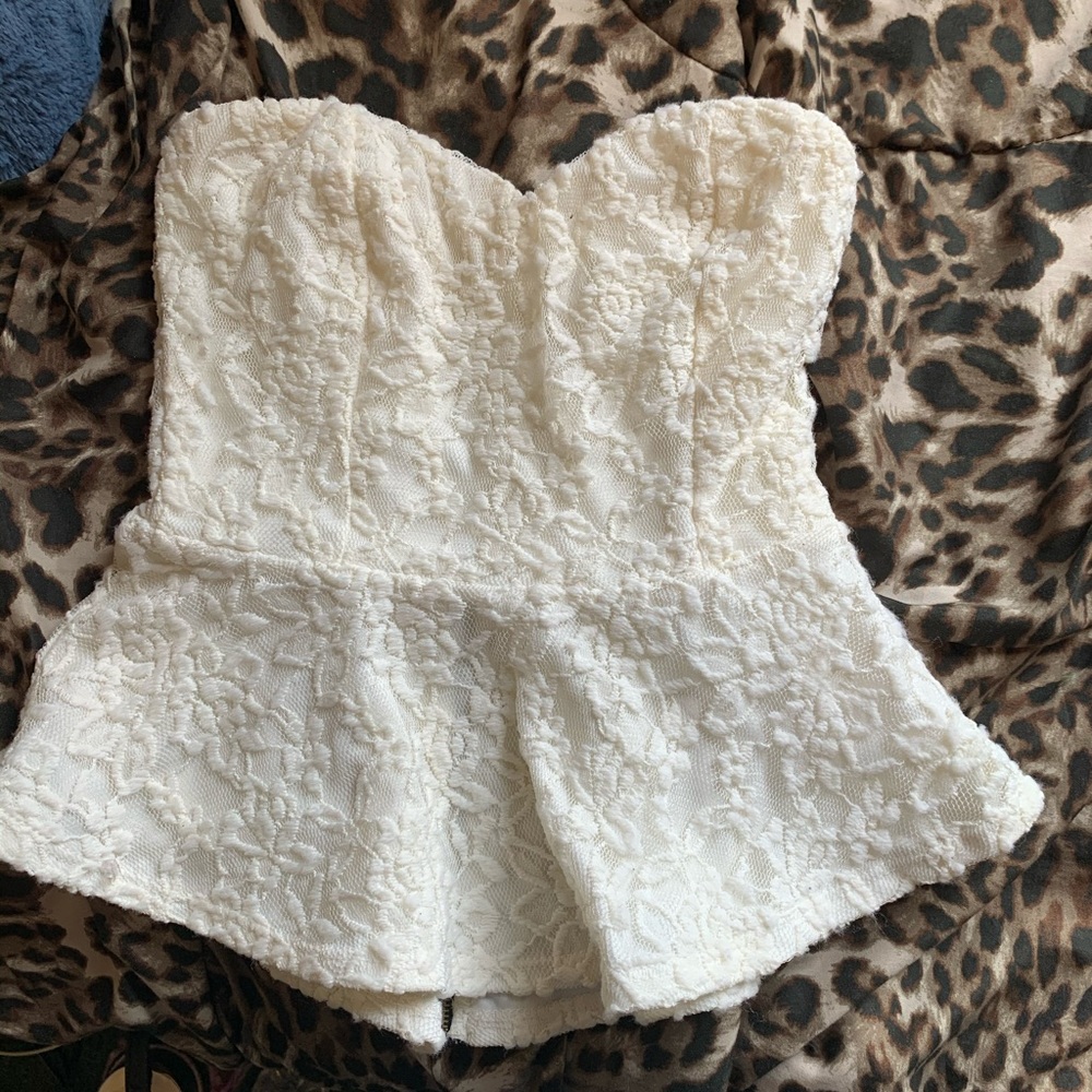 Strapless white lace peplum top